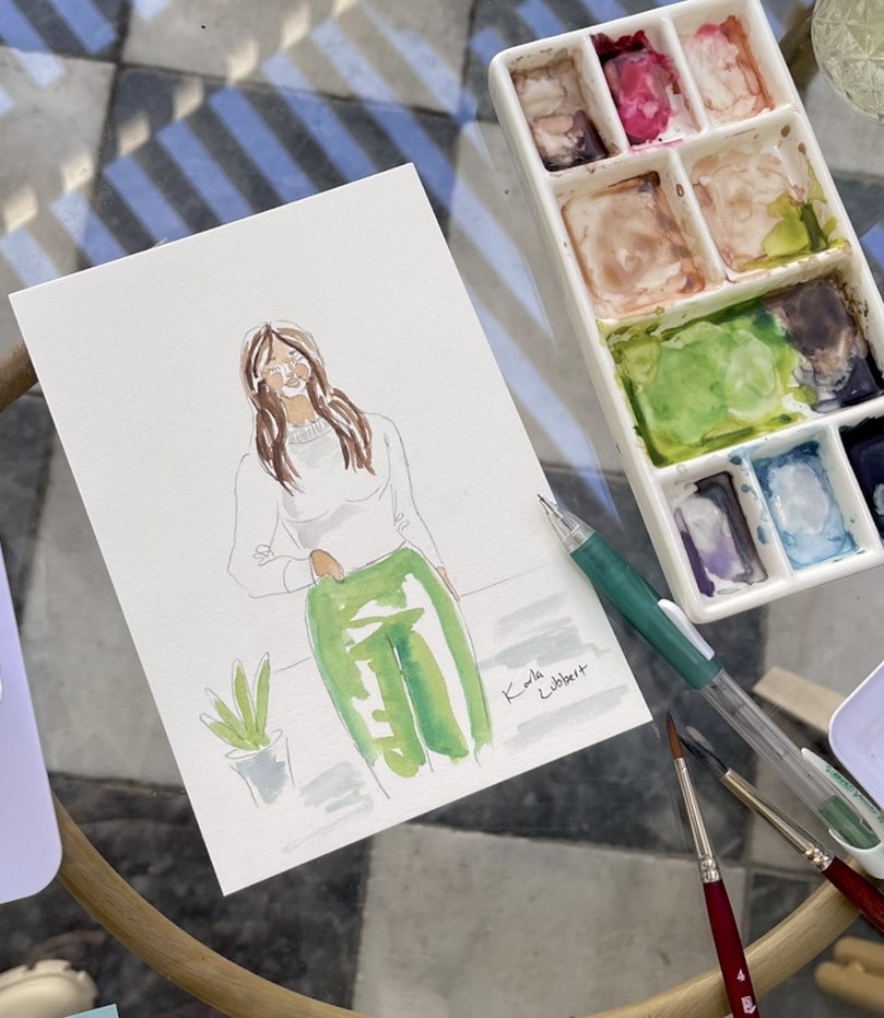 wedding watercolor live painting portrait of woman with green pants