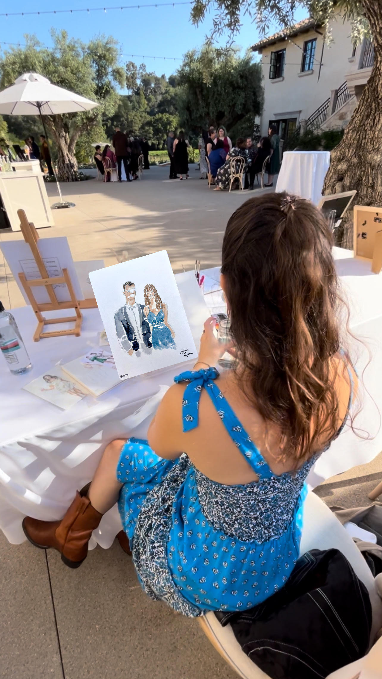 Karla the artist painting outside at Monserate Winery in Fallbrook, California